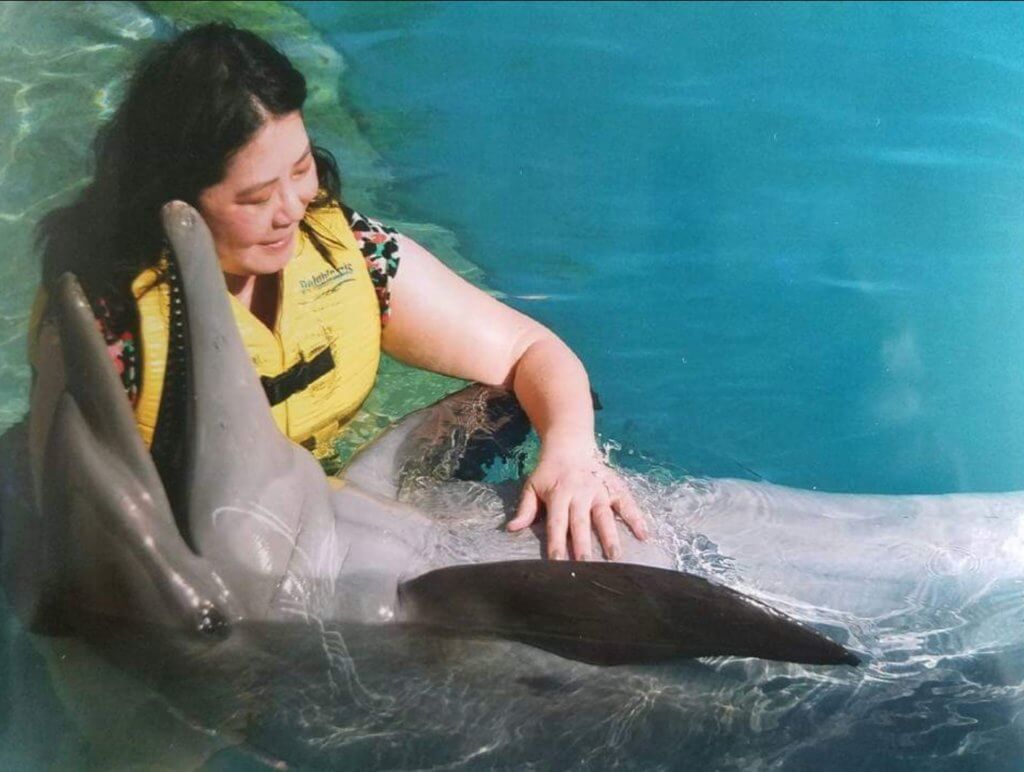 Reiki for a dolphin at Dolphinaris in Cozumel